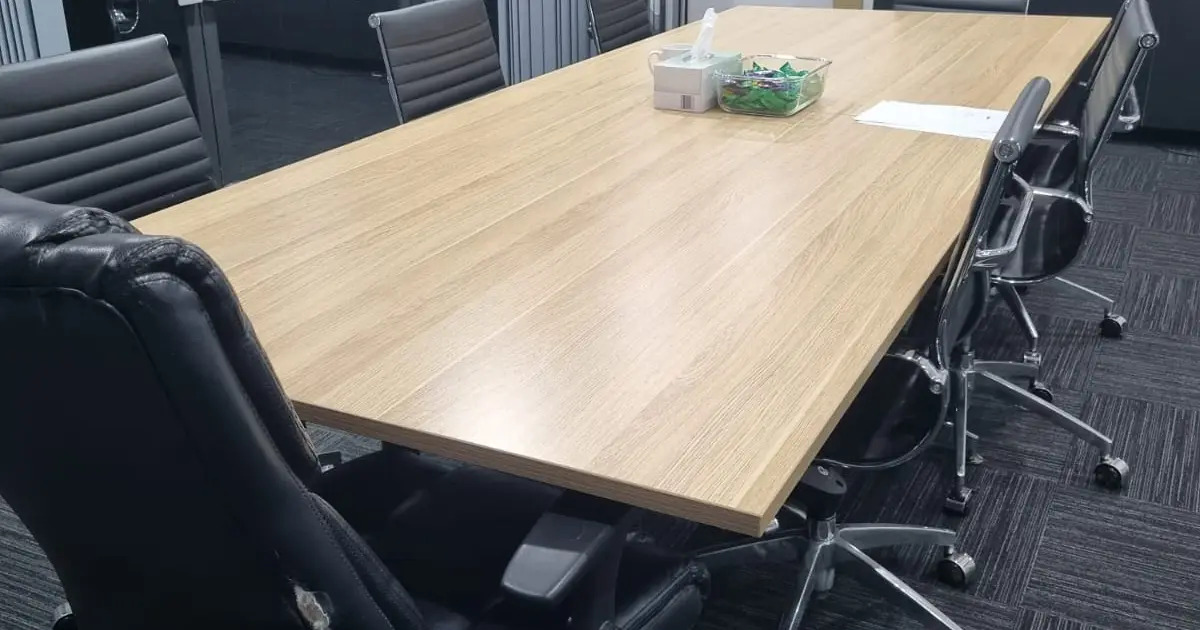 Commercial office conference room prepared for cleaning service