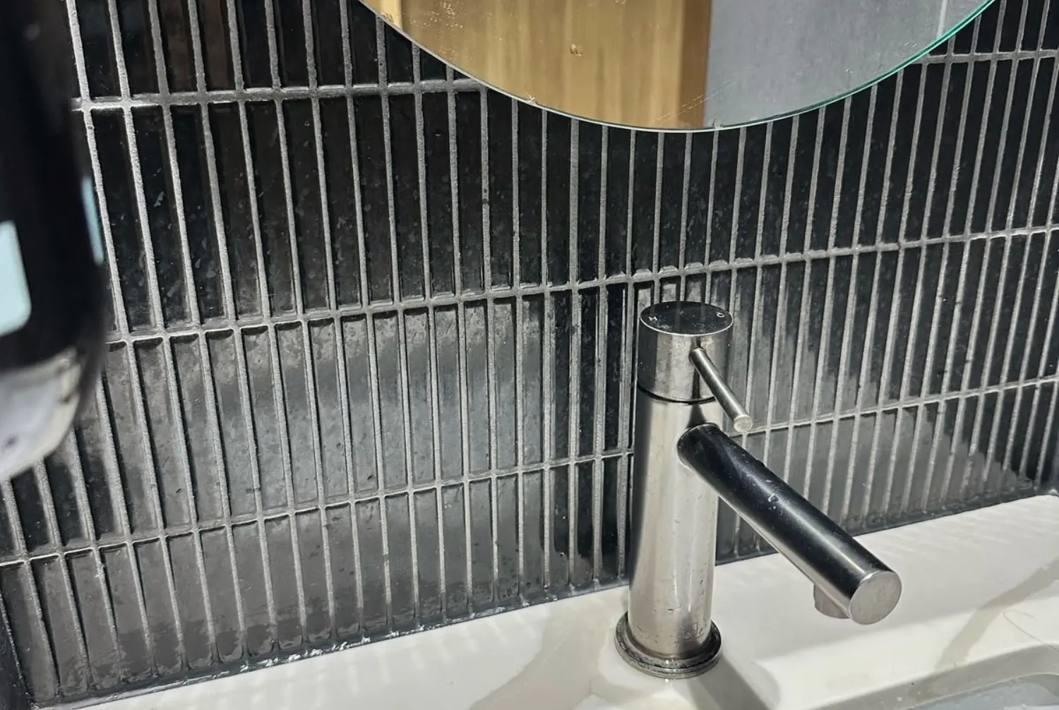 Commercial washroom sink area after cleaning