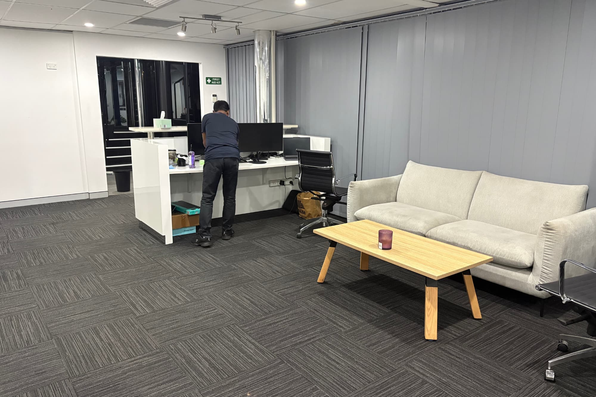 Cleaner cleaning an office workspace in Marsden Park